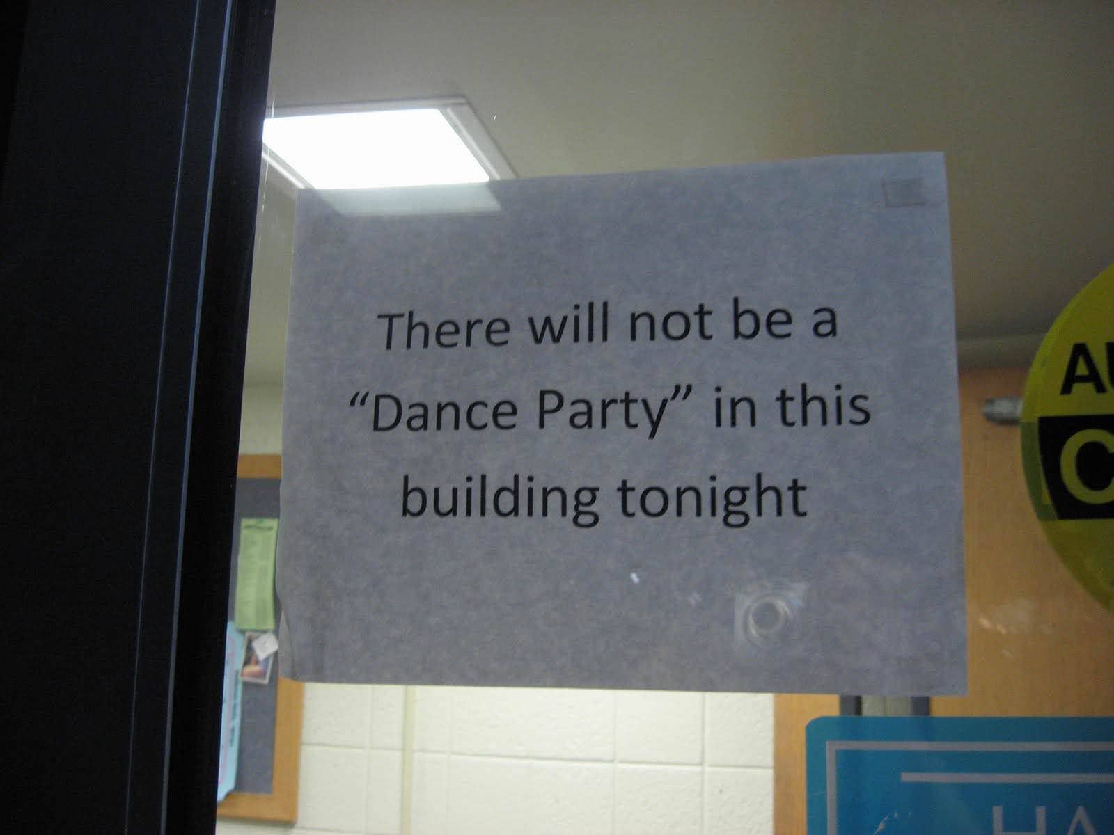 Notice on a glass door stating there will not be a dance party tonight.