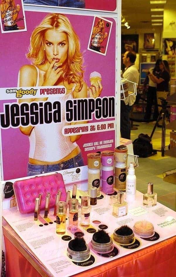 nostalgic beauty display in this gallery of 90s pictures showing a massive Sam Goody promotional stand for Jessica Simpson's Dessert Beauty line, featuring edible perfumes, dusting powders, and body lotions.