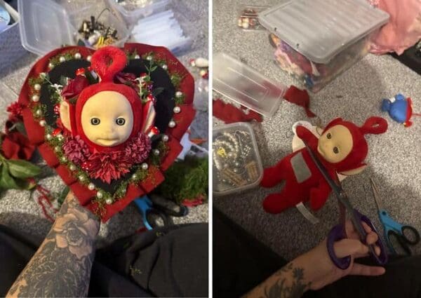 A terrifying diy fail showing a crafter unapologetically cutting the face off a red Teletubby plush to glue directly into a creepy mossy floral heart wall hanging.