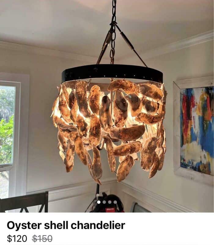 A terribly ugly home decor diy fail showing a hanging lamp chandelier crafted out of unpolished dirty oyster shells.