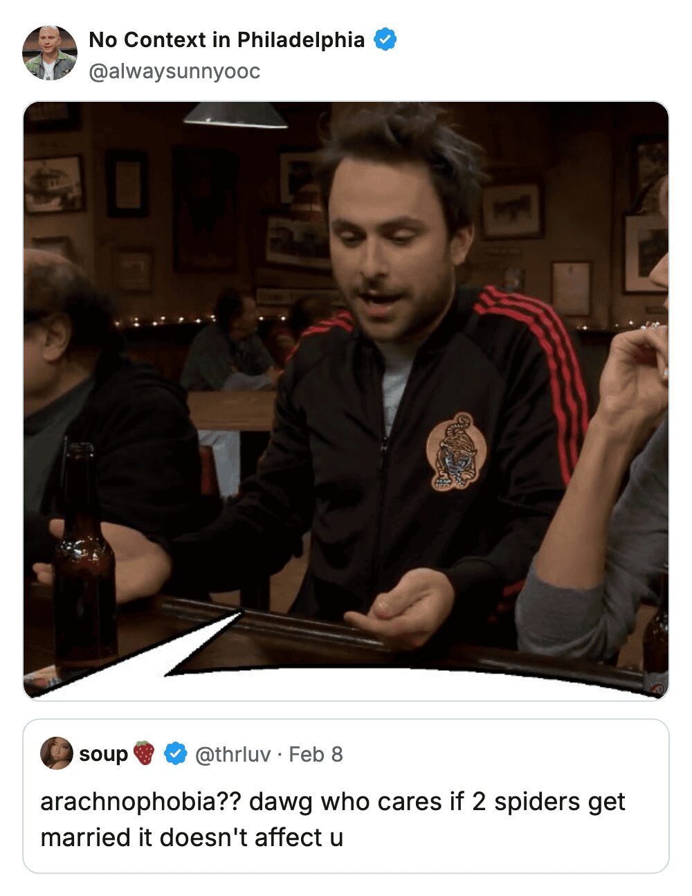 Charlie Kelly in a black track jacket making a point at the bar about spider marriage rights.