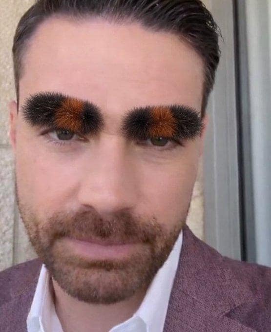 Ben Shapiro eyebrows meme where his actual eyebrows have been replaced with high-resolution images of woolly bear caterpillars, leaning into the popular "creepy-crawly" comparison trending on social media.