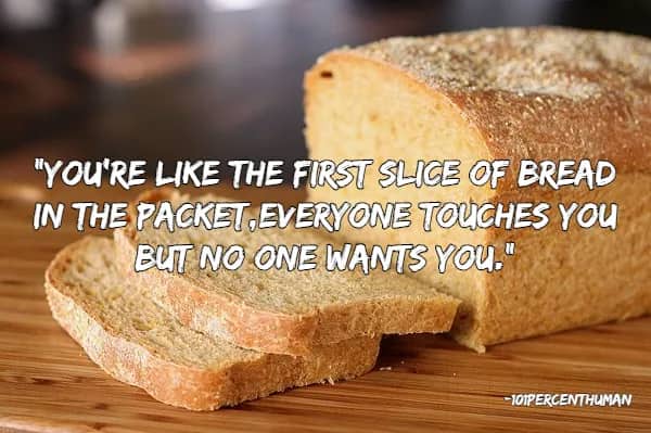 Sliced loaf of bread on a wooden board featuring a quote about being the unwanted first slice.