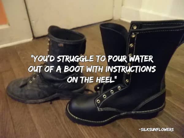 Pair of black leather work boots on a floor with a quote about struggling to pour water.