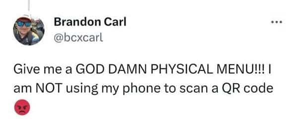 Angry social media post demanding physical restaurant menus instead of scanning digital smartphone QR codes.