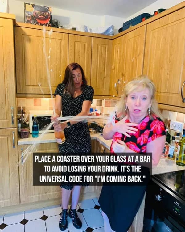 Woman accidentally spraying champagne in a kitchen with text about using coasters to save drinks.