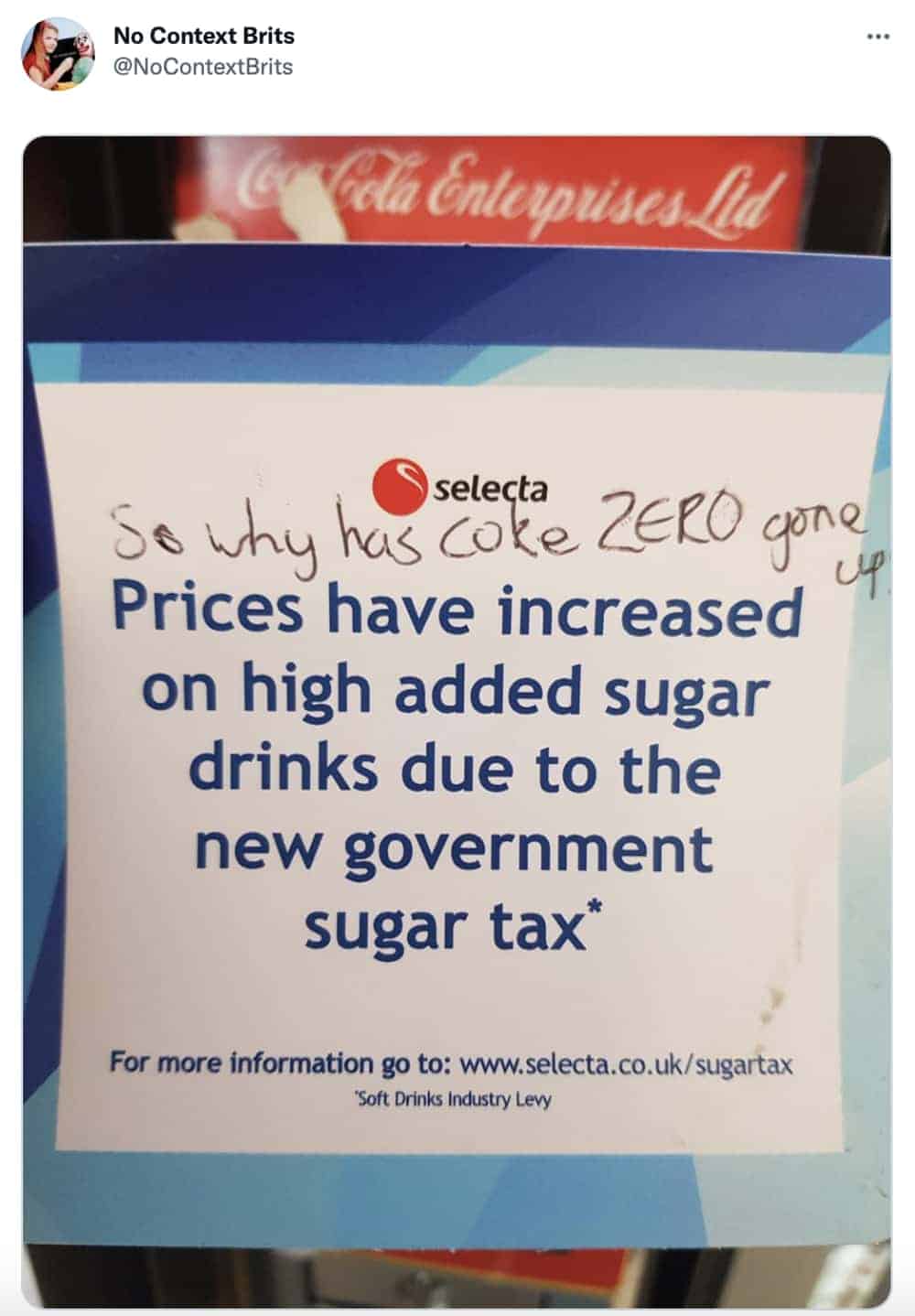 Handwritten question on vending machine challenges sugar tax logic on Coke Zero