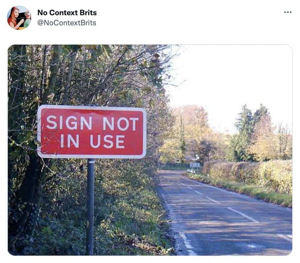 Absurd red British roadside sign declares itself officially not currently in use