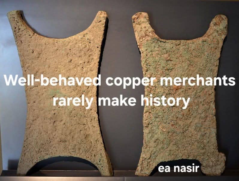 Two ancient copper ingots with a humorous caption referencing the infamous merchant Ea-Nasir and his bad copper.