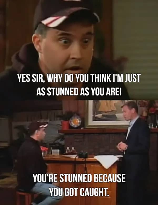 A stunned man in a baseball cap being told he is only stunned because he's caught.