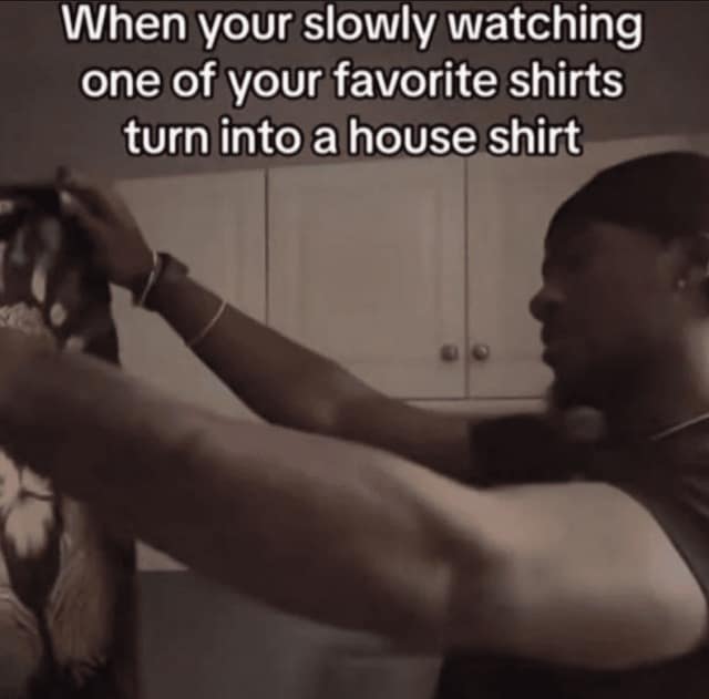 relatable classic meme showing a man sadly holding up a piece of clothing, perfectly capturing the tragic moment you slowly watch a favorite shirt degrade into just a house shirt in this stash of old memes.