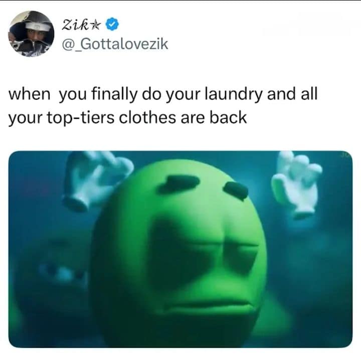 classic meme about the overwhelming joy of finishing chores. The top text reads, "when you finally do your laundry and all your top-tiers clothes are back," paired with a glowing green M&M character looking upward with a blissful, enlightened expression as if receiving a divine blessing.