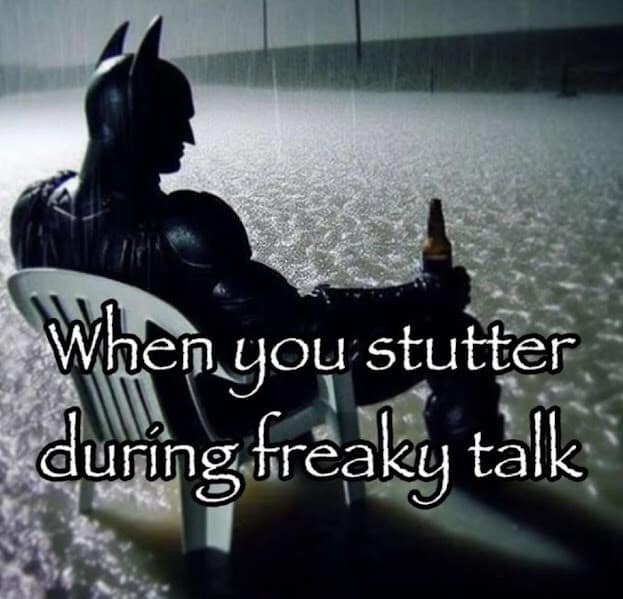 relatable classic meme featuring Batman sitting sadly in a plastic lawn chair in the pouring rain with a beer, perfectly capturing the immense shame and self-reflection of stuttering during freaky talk.