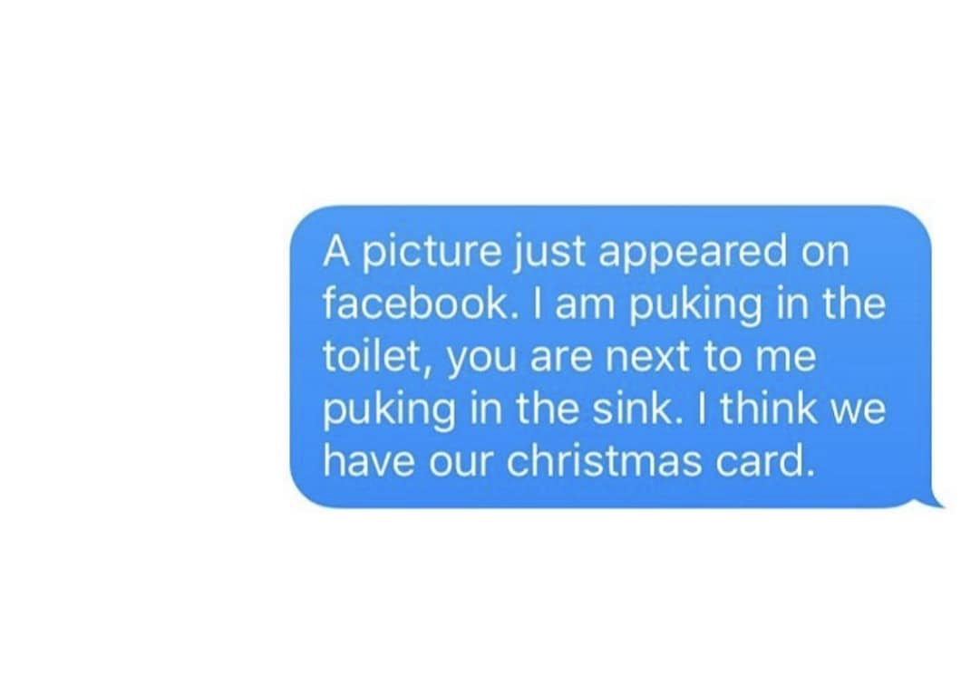 unhinged classic meme text message proposing a romantic Christmas card idea, noting that a Facebook picture was just posted showing one person puking in the toilet while their partner puked in the nearby sink.