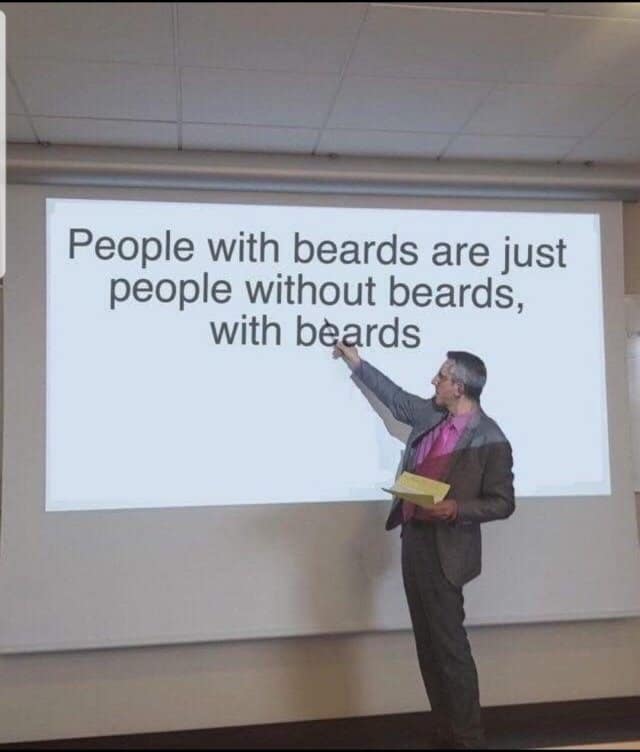 A brilliant classic meme showing a professor confidently pointing at a presentation screen that shares the profound wisdom that people with beards are just people without beards with beards, adding some highly literal humor to your collection of old memes.