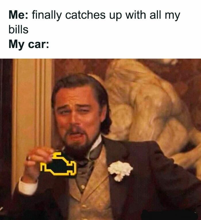 classic meme showing a smug Leonardo DiCaprio laughing while holding a glowing yellow check engine light icon, flawlessly capturing the exact moment a car decides to break down right after paying off all bills.