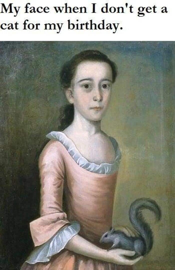 A disappointed classical art meme showing an 18th-century portrait of a girl with a blank, deadpan expression. Instead of the expected kitten, she is holding a large grey squirrel. The text reads: "My face when I don't get a cat for my birthday