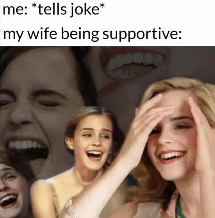 Emma Watson laughing hysterically to represent a wife being supportive of a husband's bad joke.