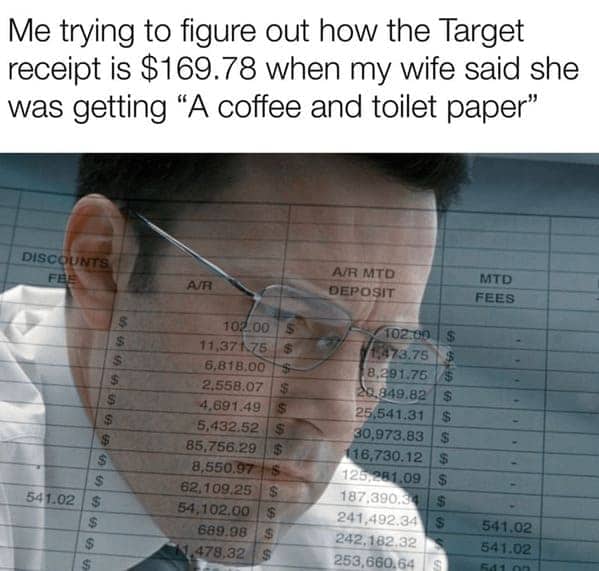 Confused man analyzing massive Target receipt after wife's simple shopping trip