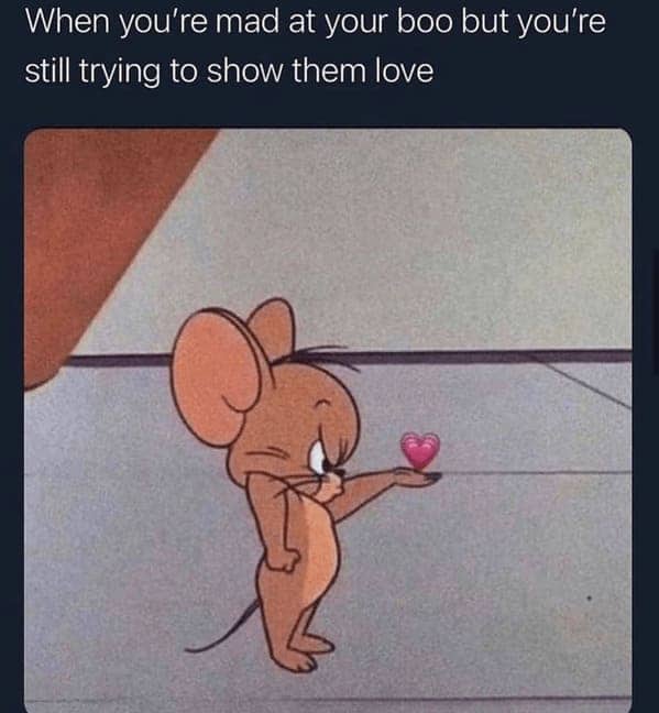 Jerry Mouse angrily offering tiny heart while still mad at partner