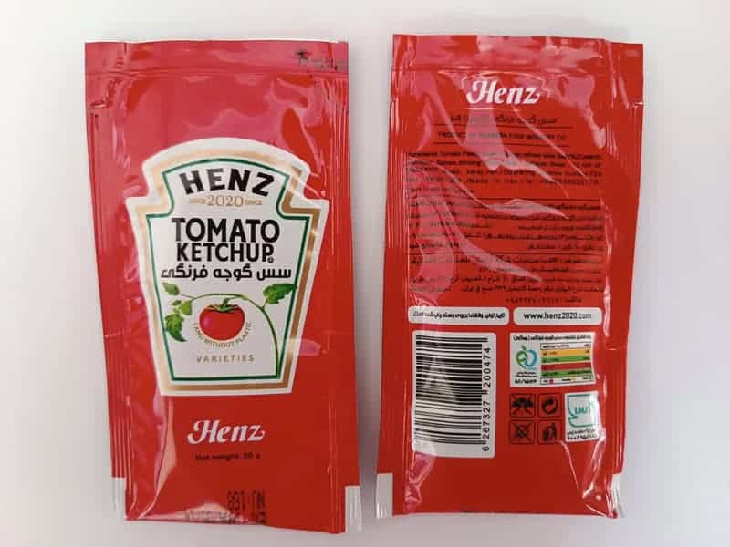 Ketchup packets with a logo that says Henz instead of the famous brand name Heinz.