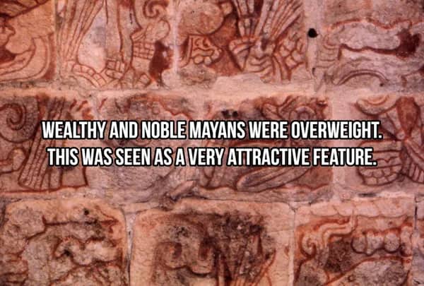 Detailed stone relief carving depicting wealthy and noble Mayans where being overweight symbolized high status.