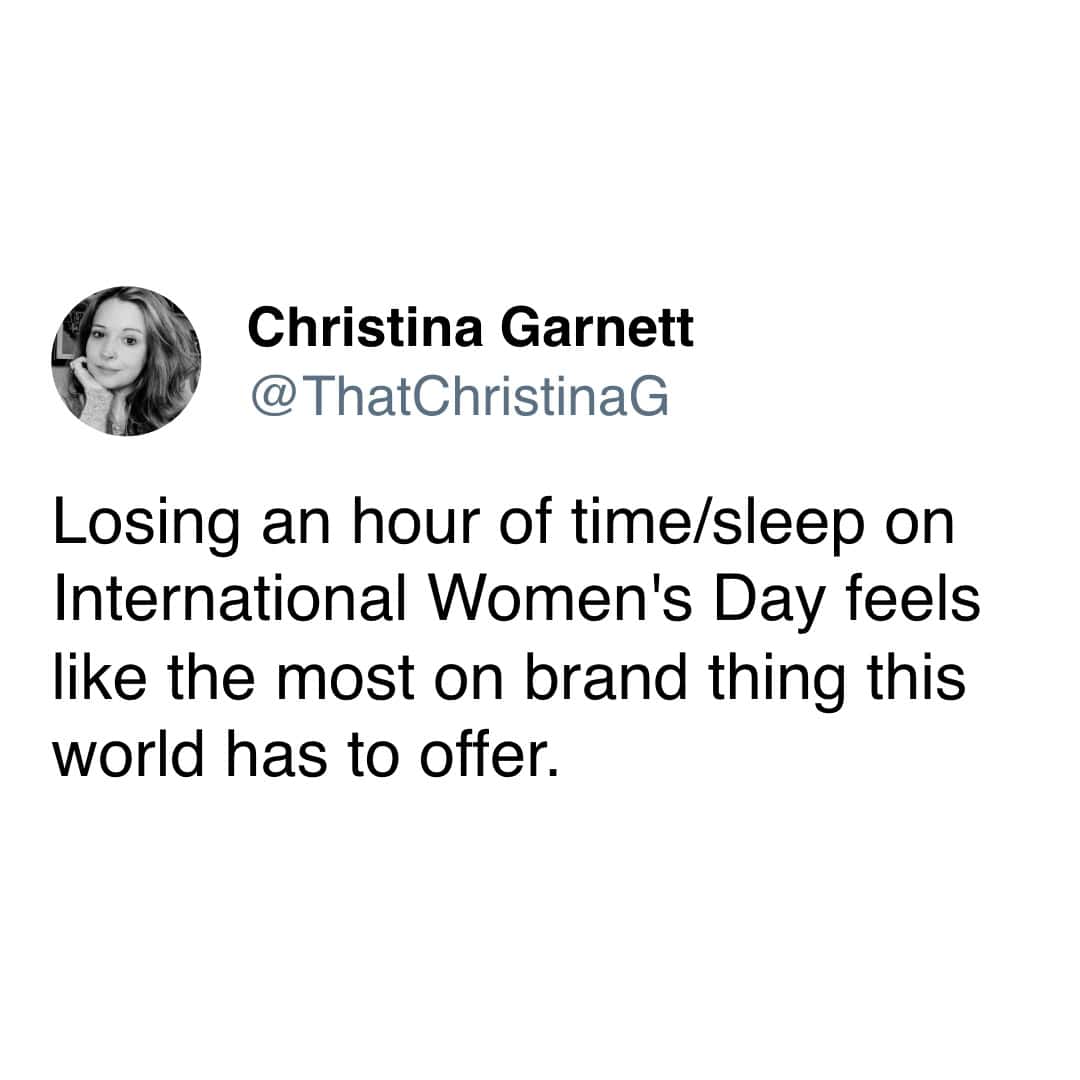 darkly funny daylight savings meme pointing out the painful irony of the calendar, noting that literally losing an hour of time and sleep exactly on International Women's Day feels incredibly on-brand for the world.
