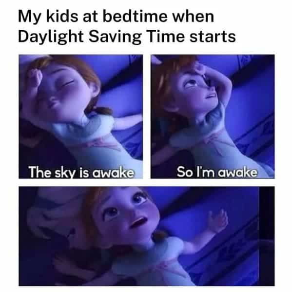 A highly relatable parenting daylight savings meme using Anna from Frozen wide awake in bed to perfectly represent the absolute struggle of kids refusing to sleep because "the sky is awake, so I'm awake".