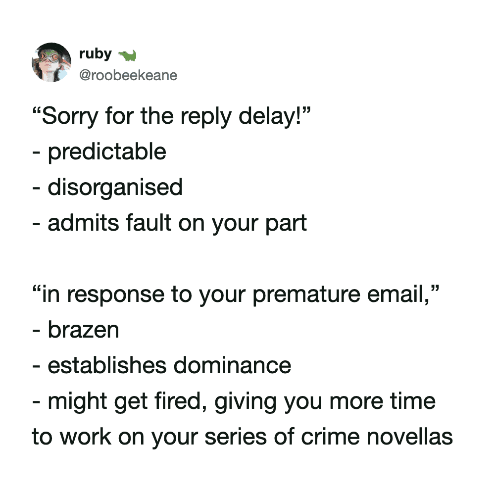 A dominant work email meme from @roobeekeane comparing two delay responses. It contrasts the "disorganized" and "at fault" "Sorry for the reply delay!" with the "brazen" and "dominant" opener: "in response to your premature email."