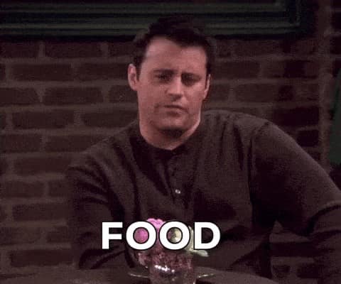 Joey Tribbiani from Friends looking deeply serious with the caption FOOD representing the ultimate priority in this classic food meme.