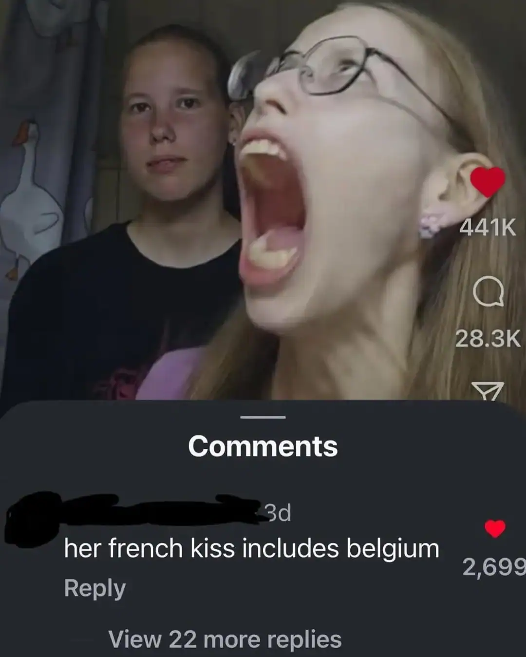 Social media comment on a girl with a large open mouth saying her kiss includes Belgium.