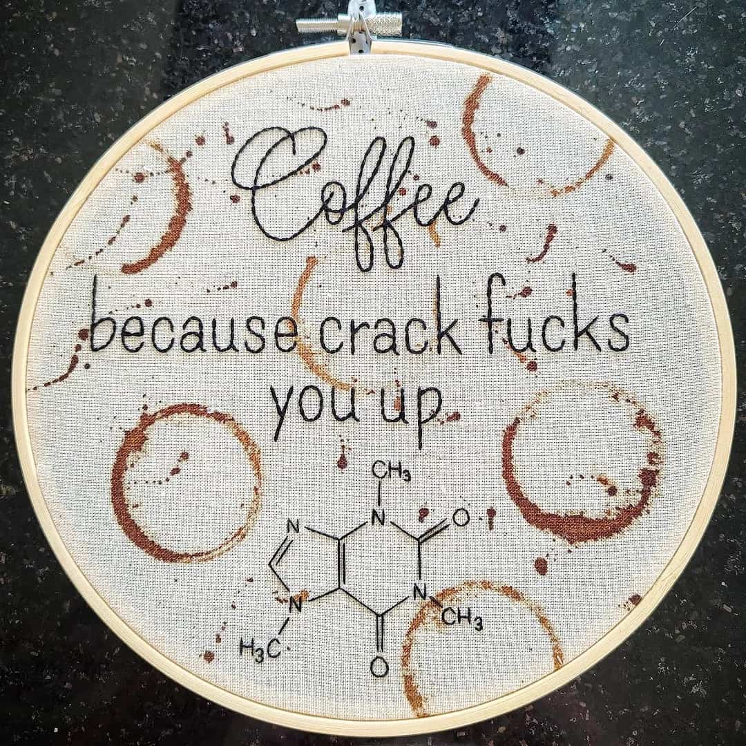 Needlework featuring coffee ring stains, a caffeine molecule, and a humorous quote about crack
