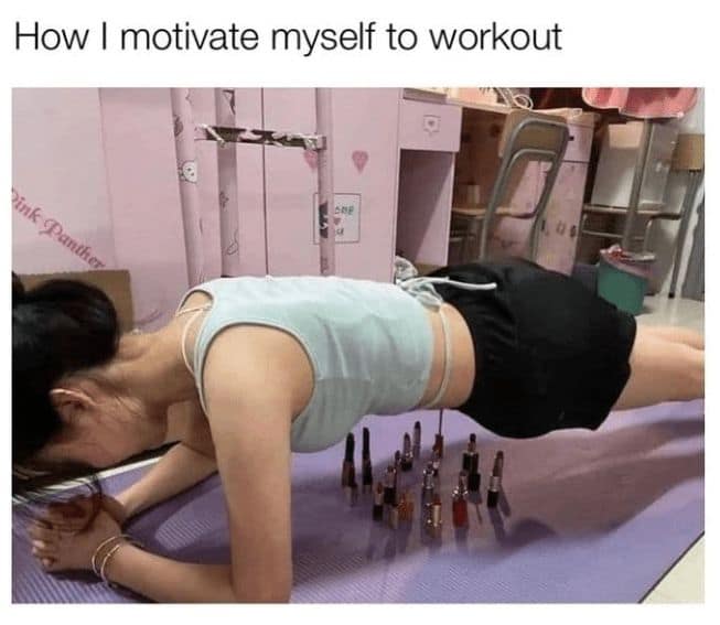high-stakes body positivity meme showing a girl holding a plank position over a collection of expensive, upright lipsticks as the ultimate motivation not to drop.