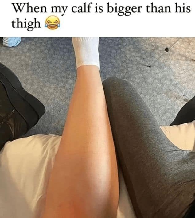 This viral body positivity meme shows a woman's muscular calf held up next to a man's thigh, jokingly pointing out that her lower leg is larger than his upper leg
