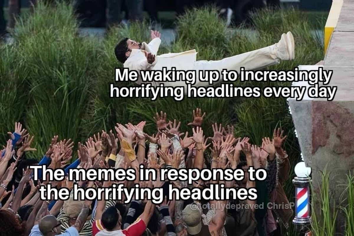 A crowd of hands reaching up to catch a person falling from a ledge.