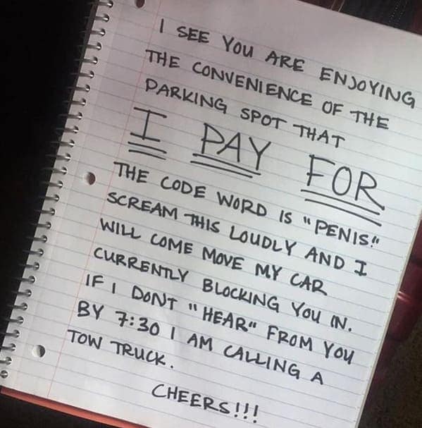high-octane neighbors from hell handwritten note in a notebook. The author informs a neighbor they are being blocked in for stealing a paid parking spot, stating that the only way they will move their car is if the neighbor screams the "code word" "PENIS!" loudly enough to be heard.
