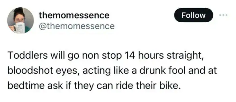 parenting meme tweet from themomessence describing the unhinged stamina of small children. She compares a toddler's 14-hour high-energy streak—complete with bloodshot eyes and "drunk fool" behavior—to the moment they finally hit bedtime and suddenly ask to go for a bike ride.