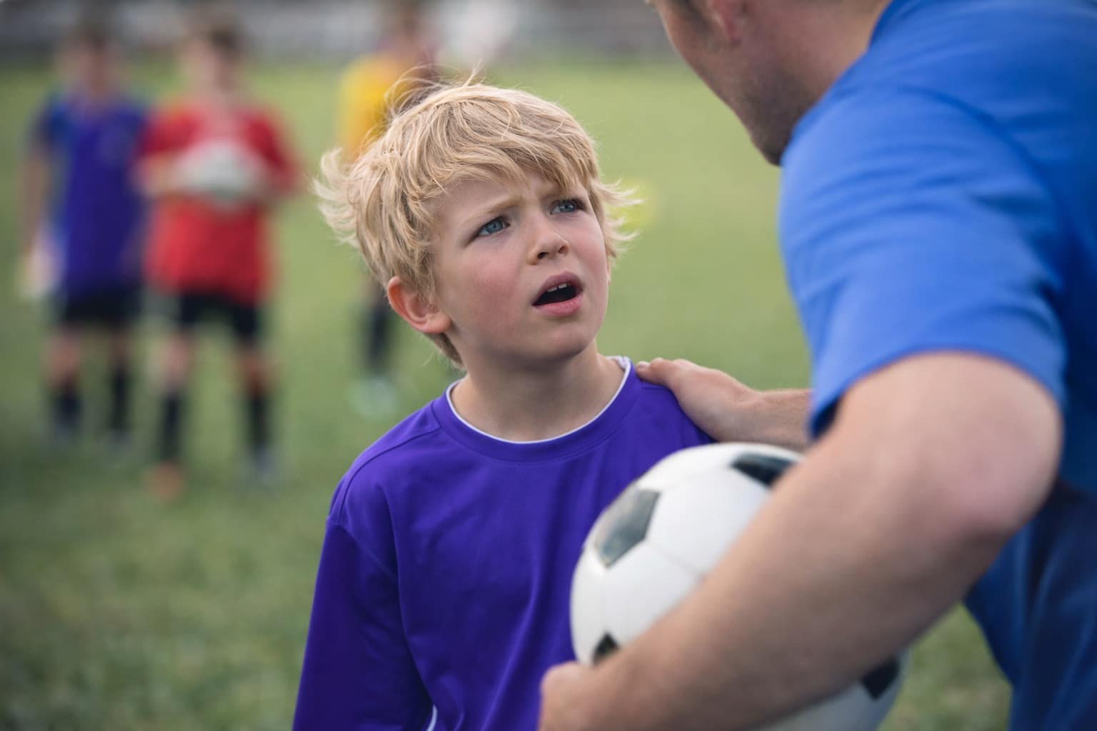 20-image gallery packed with every funny parenting tweet that captures the chaos of youth athletics, featuring standouts like a nine-year-old referee yellow-carding a grown woman, a whole softball team getting their hands stuck in mason jars, and a first-grader trying to start a fire at midfield.