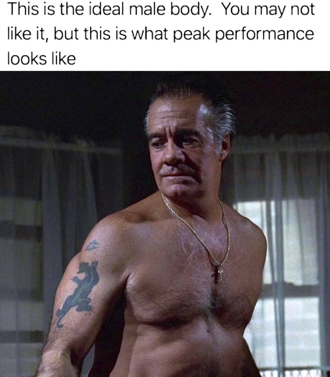 Screen capture of Paulie Walnuts from The Sopranos with the "ideal male body" meme caption.