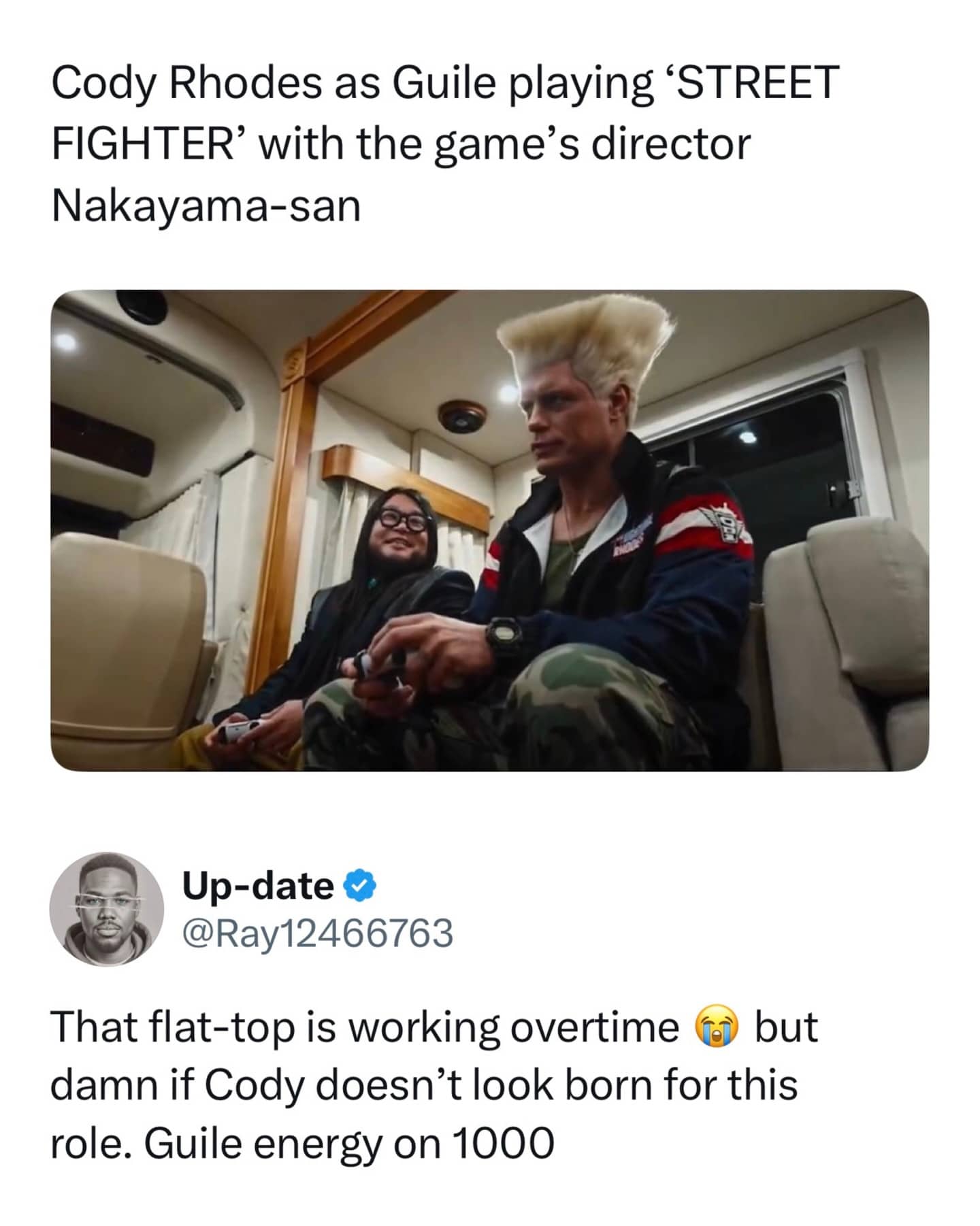 Pro wrestler Cody Rhodes with a tall blonde flat-top haircut dressed as the character Guile.