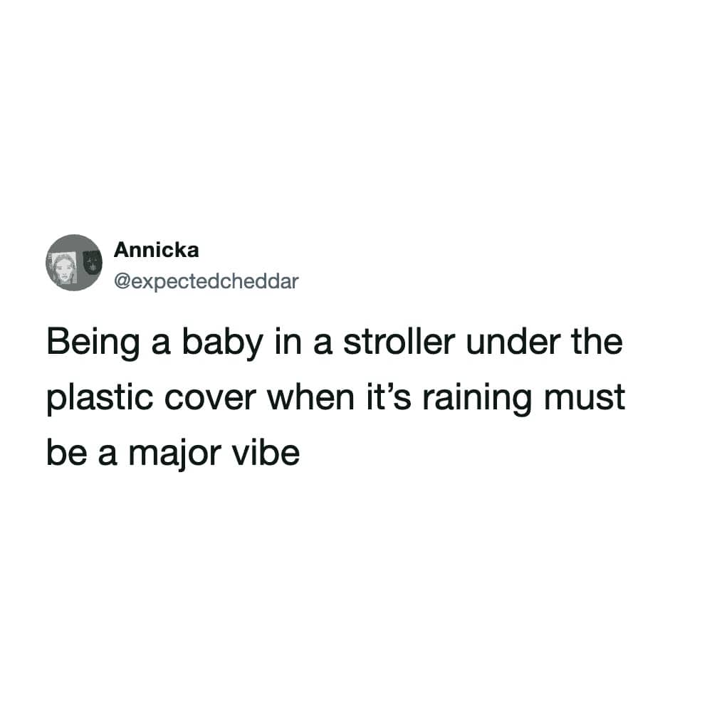 Tweet by Annicka about the cozy vibe of being a baby in a rain-covered stroller.