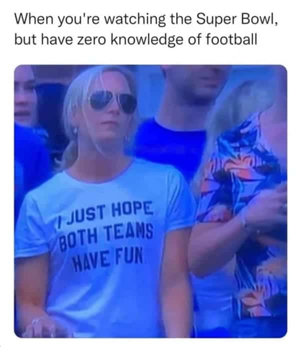 Woman at the Super Bowl wearing a shirt that says I just hope both teams have fun.