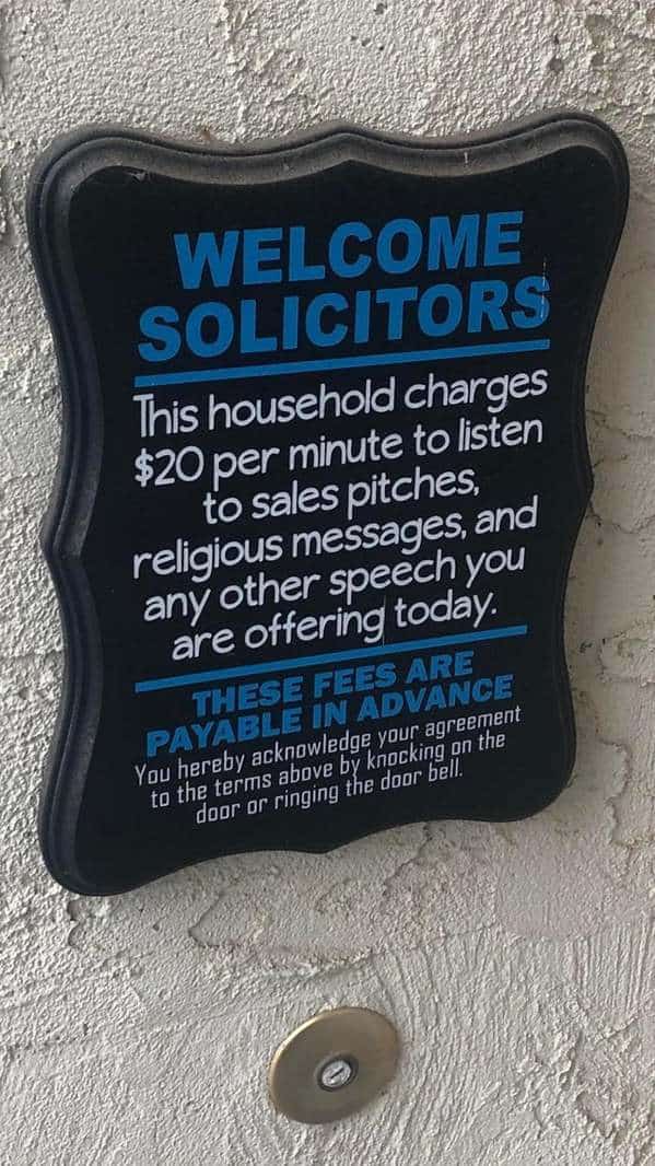 A no-nonsense funny sign designed to ward off door-to-door salesmen. It "welcomes" solicitors but informs them the household charges $20 per minute to listen to any "sales pitches, religious messages, or other speech," with fees "payable in advance" by ringing the bell.