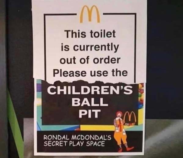 A chaotic funny sign appearing to be a bootleg McDonald's announcement. The top portion says the toilet is out of order, while a pasted-on bottom section directs patrons to use the "CHILDREN'S BALL PIT" in "Rondal McDondal's Secret Play Space."