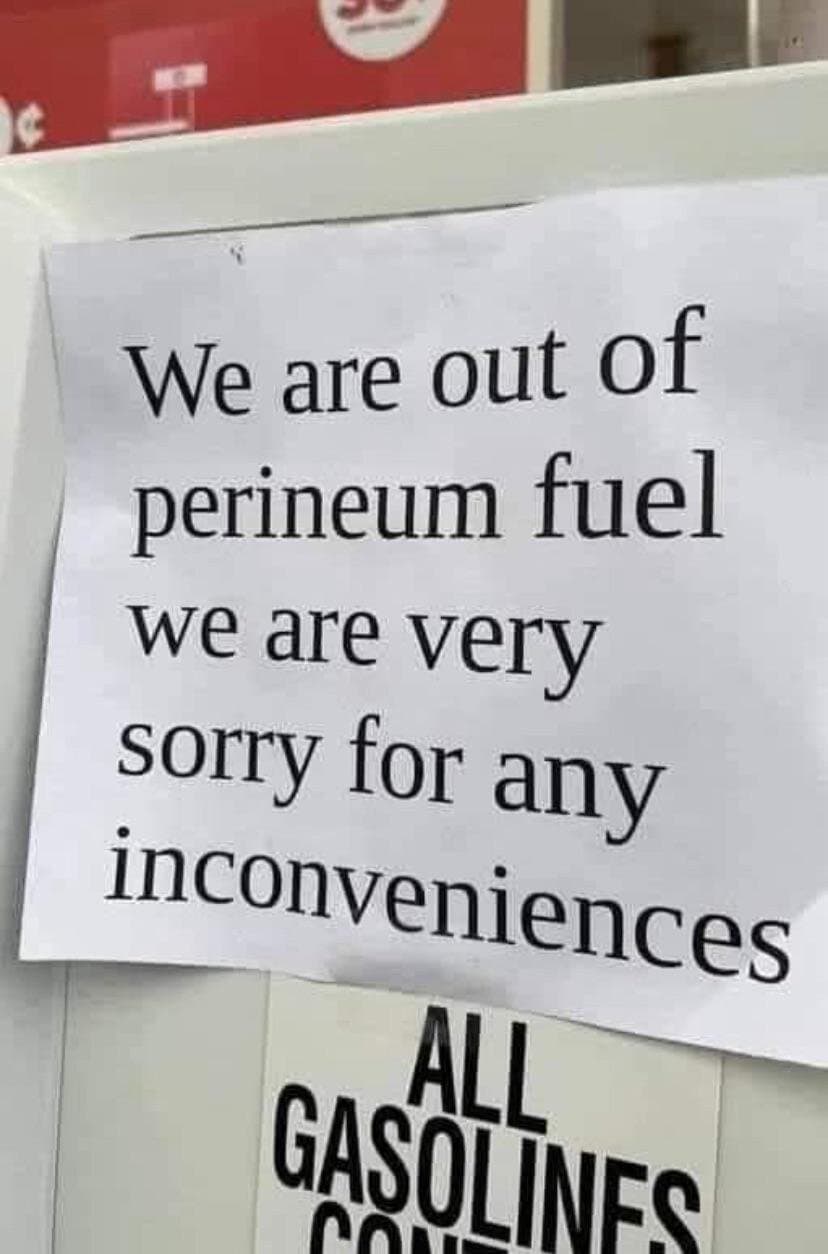 printed sign at a gas station apologizing because they are "out of perineum fuel," a cringeworthy funny spelling mistake where the word "premium" was replaced with a very different anatomical term.