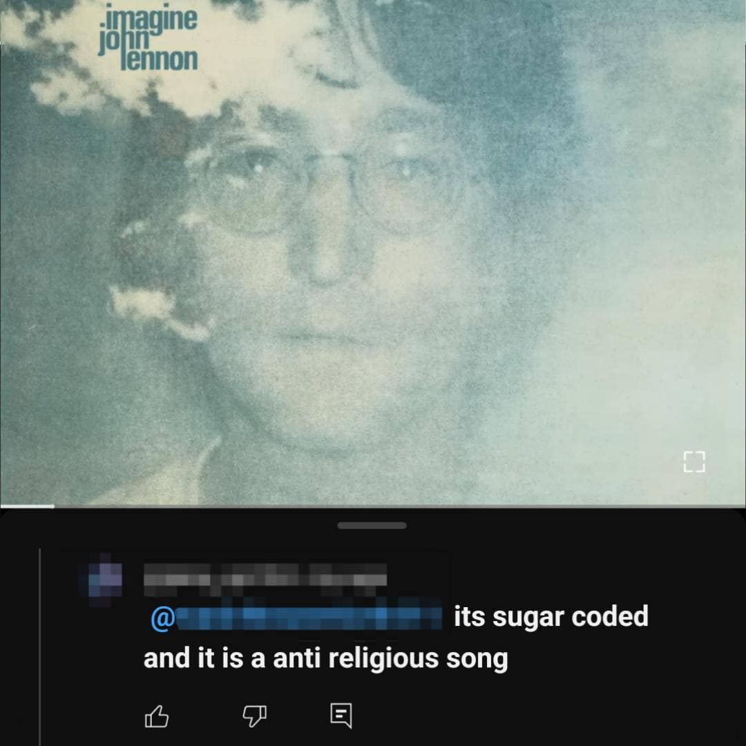 YouTube comment on John Lennon's "Imagine" that features a funny spelling fail, claiming the anti-religious song is actually "sugar coded" instead of "sugarcoated."