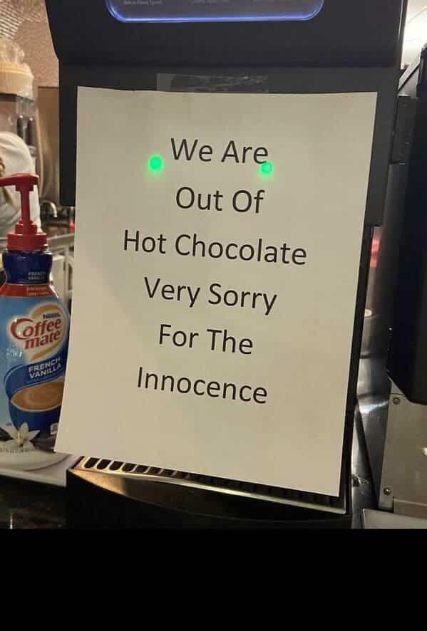 Coffee shop sign apologizing for the "Innocence" instead of the "Inconvenience" of being out of chocolate.