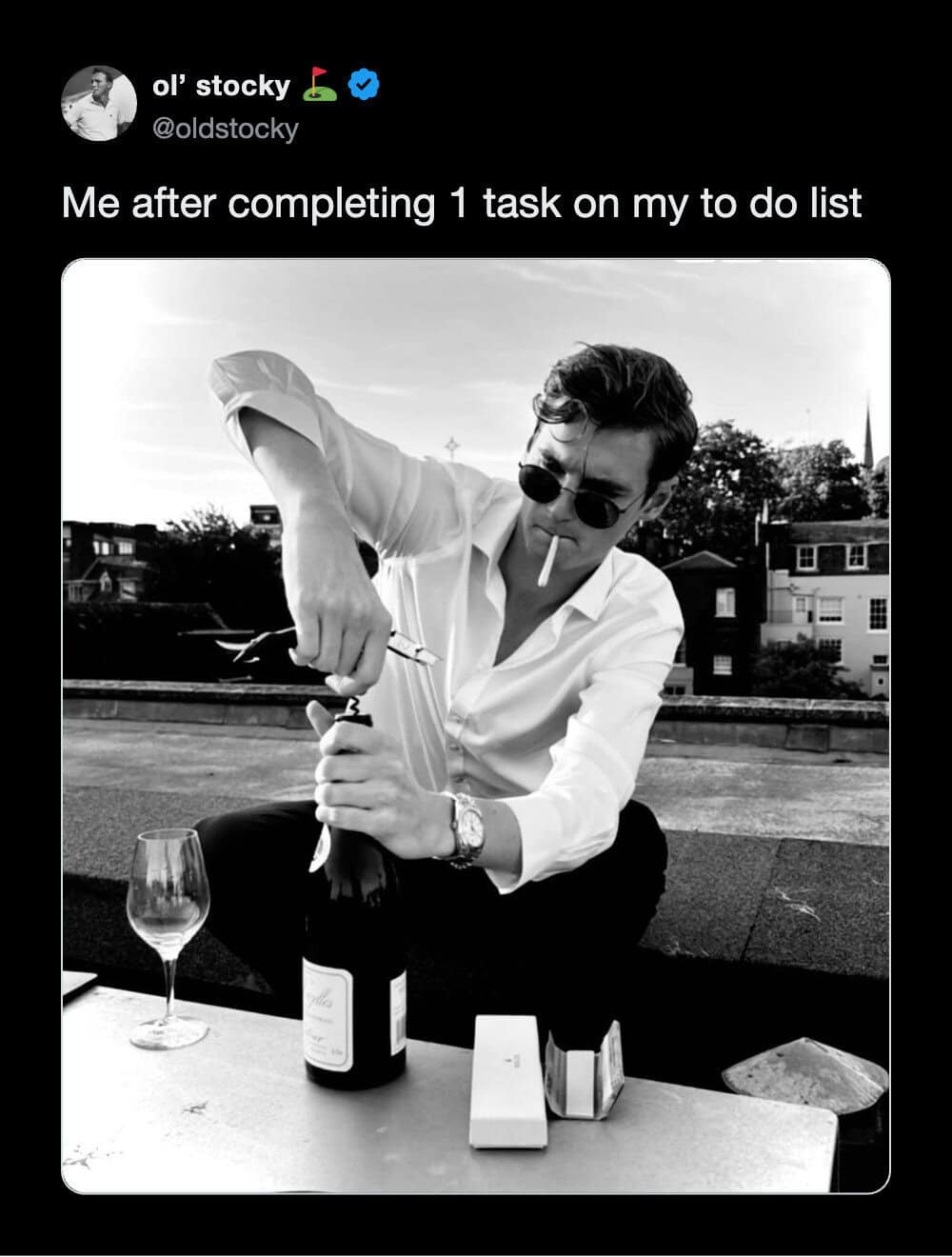 A highly relatable funny tweet showing a sharp, suave man in sunglasses aggressively opening a bottle of champagne while smoking a cigarette, perfectly representing the sheer exhaustion of celebrating after completing exactly one minor task on a to-do list.