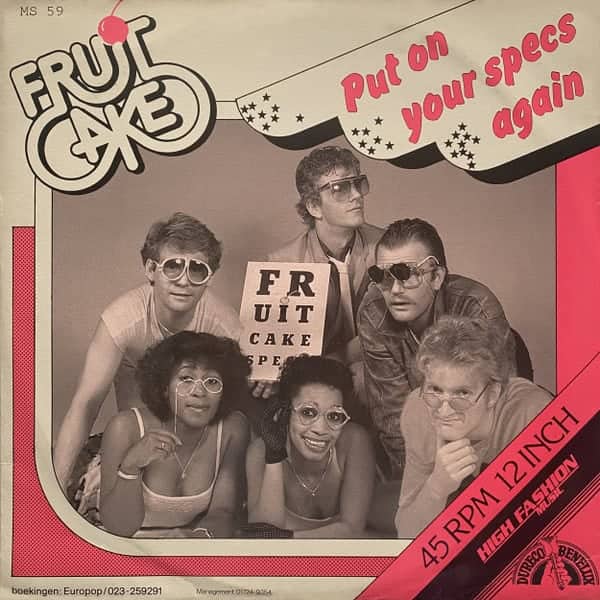 Retro pop album cover for Fruitcake featuring a group wearing oversized, comedic novelty eyeglasses.
