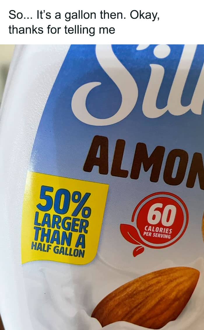 Silk Almond milk bottle with label 50% larger than a half gallon captioned as a gallon.